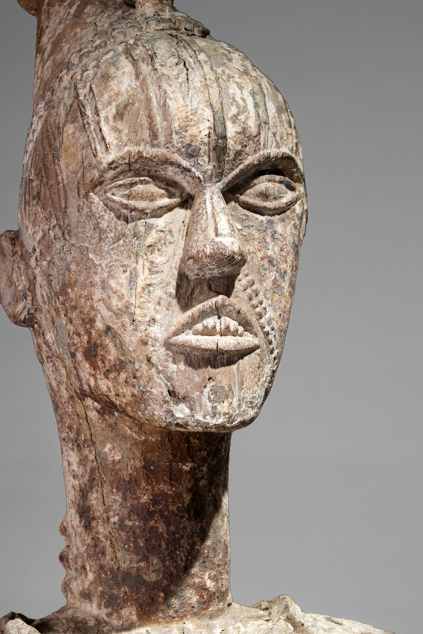 A very expressive female seated Urhobo sculpture