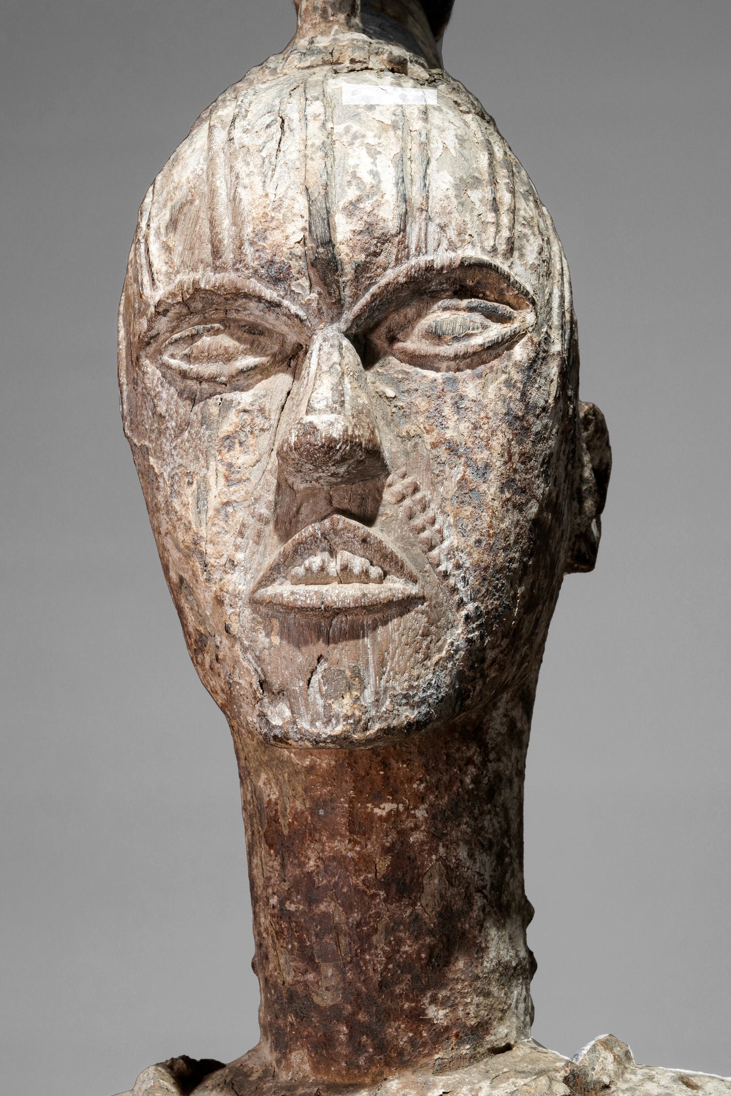 A very expressive female seated Urhobo sculpture