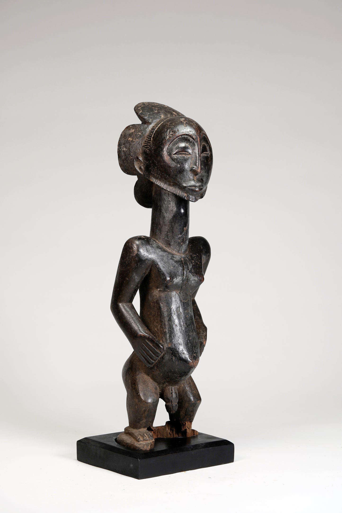 A fragmentary male Hemba statue