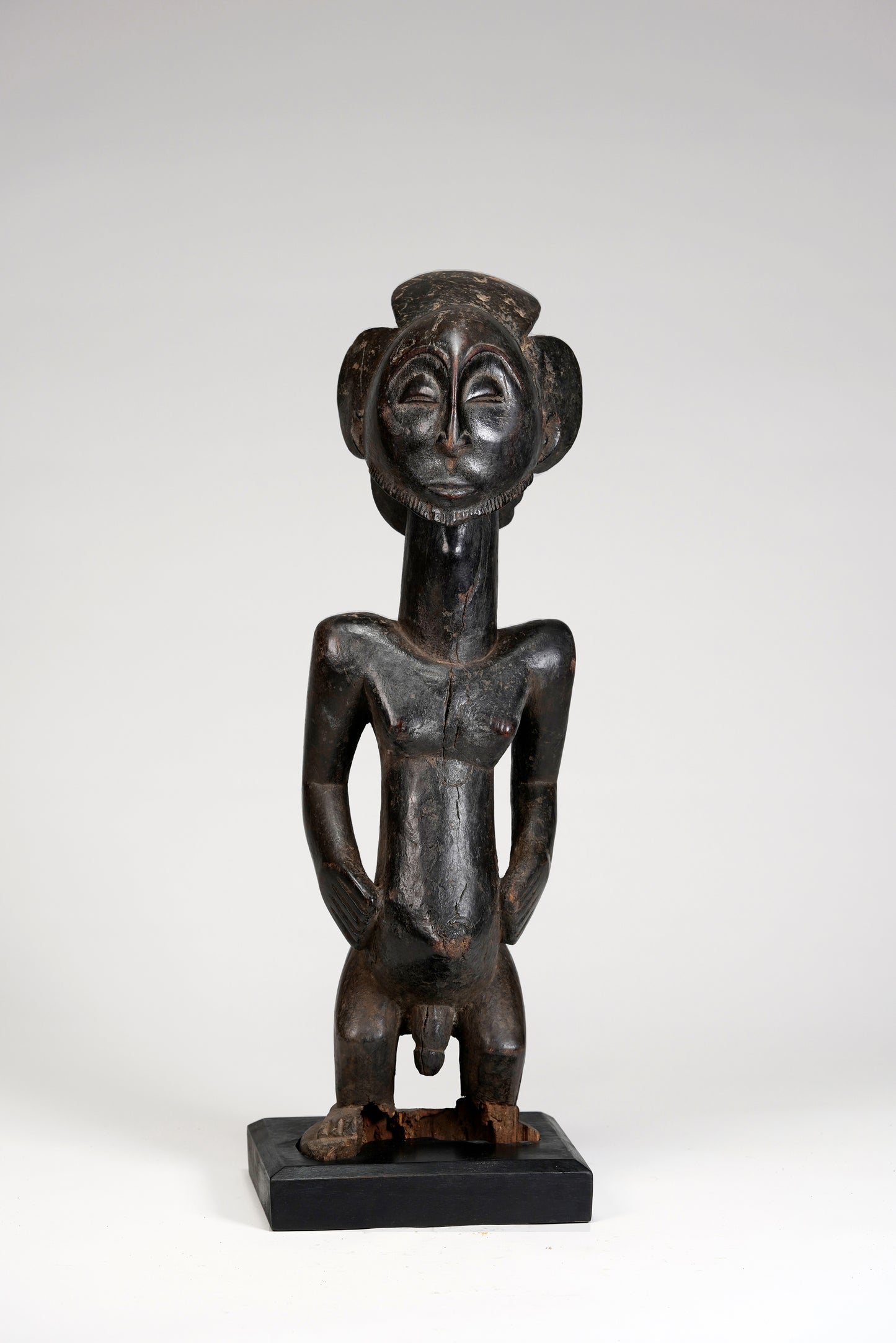 A fragmentary male Hemba statue
