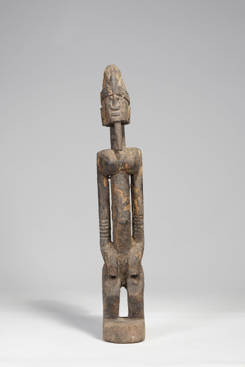 A fragmented male Dogon sculpture