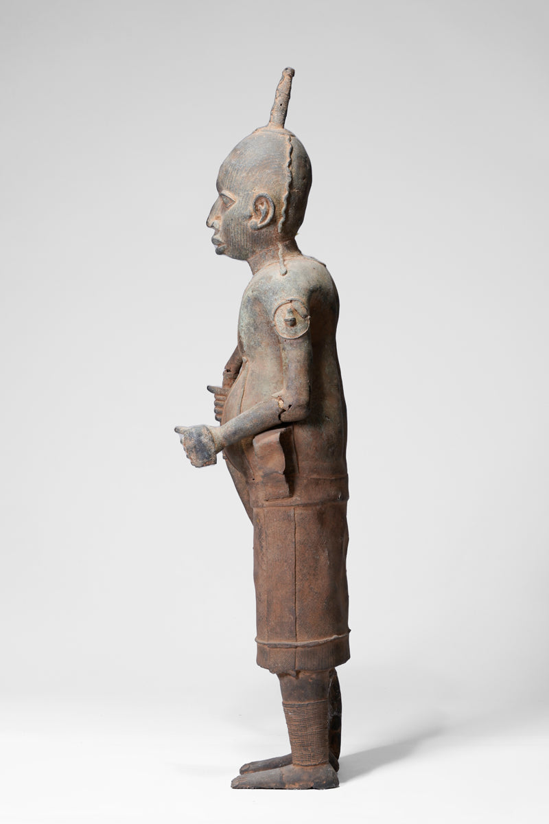 A fragmentary bronze sculpture