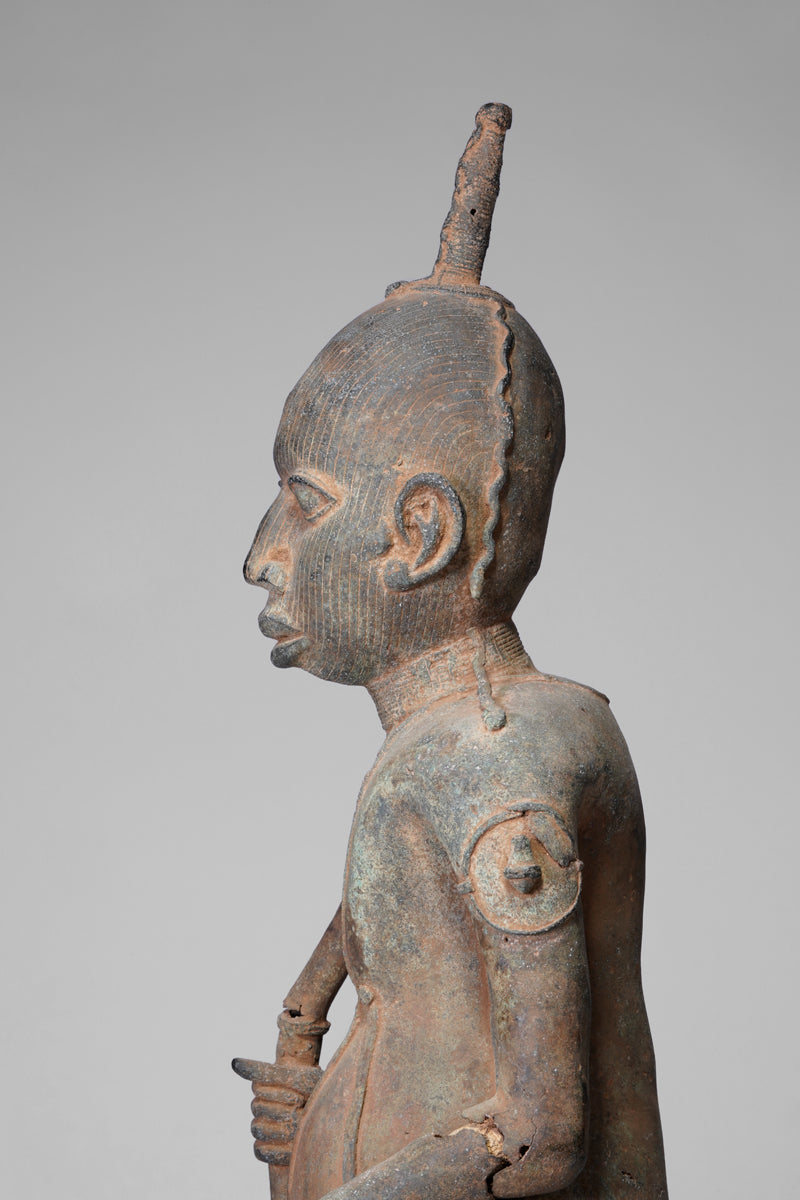 A fragmentary bronze sculpture