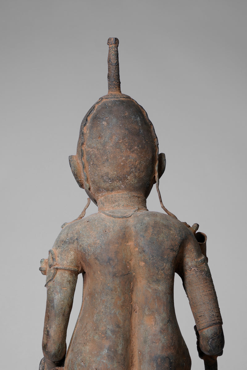 A fragmentary bronze sculpture