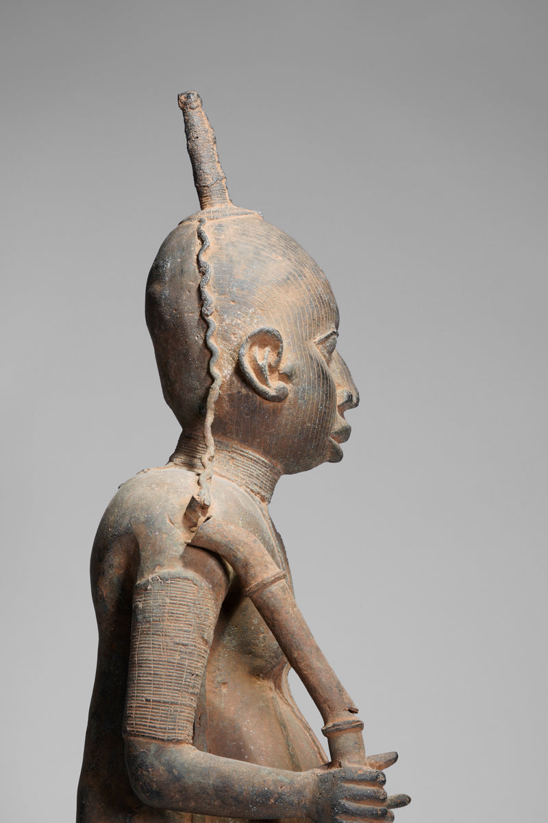 A fragmentary bronze sculpture