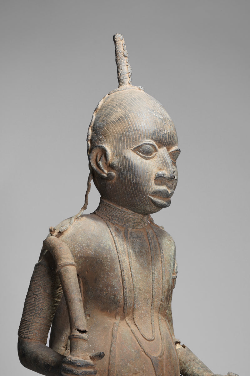 A fragmentary bronze sculpture