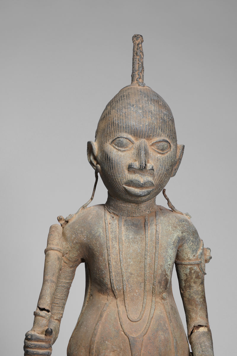 A fragmentary bronze sculpture