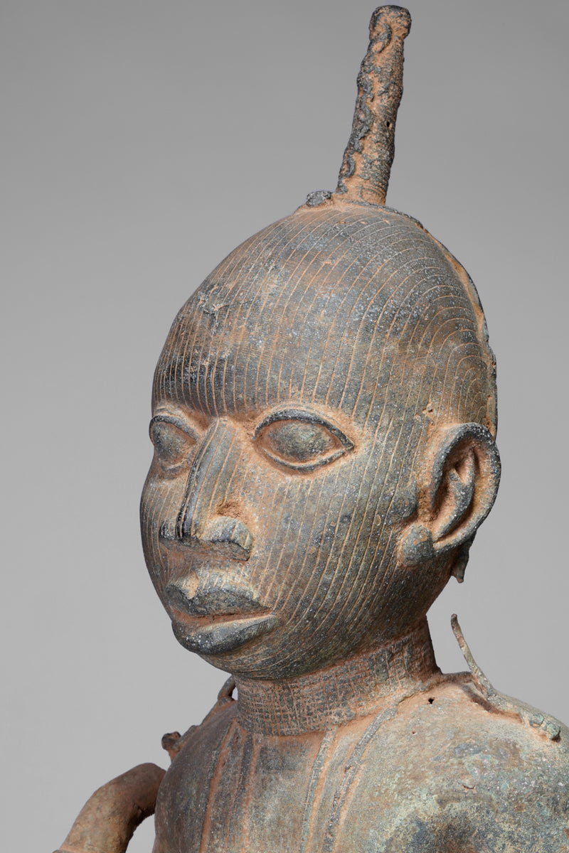 A fragmentary bronze sculpture