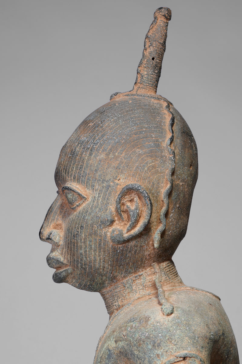 A fragmentary bronze sculpture