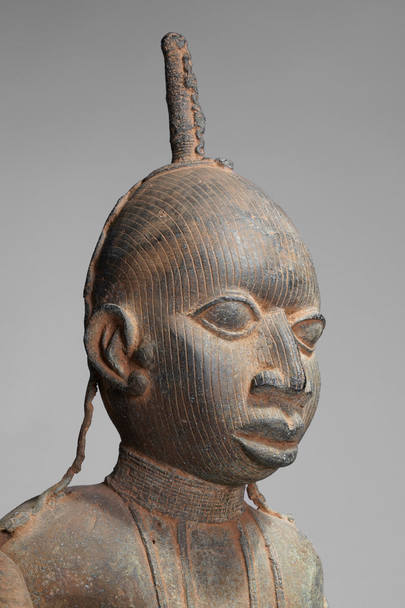 A fragmentary bronze sculpture