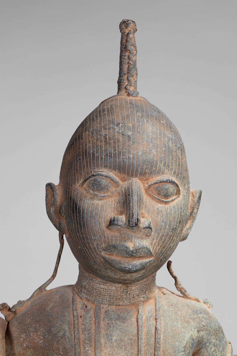 A fragmentary bronze sculpture