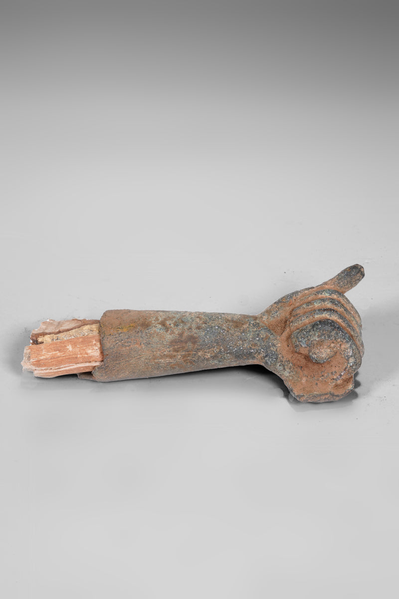 A fragmentary bronze sculpture