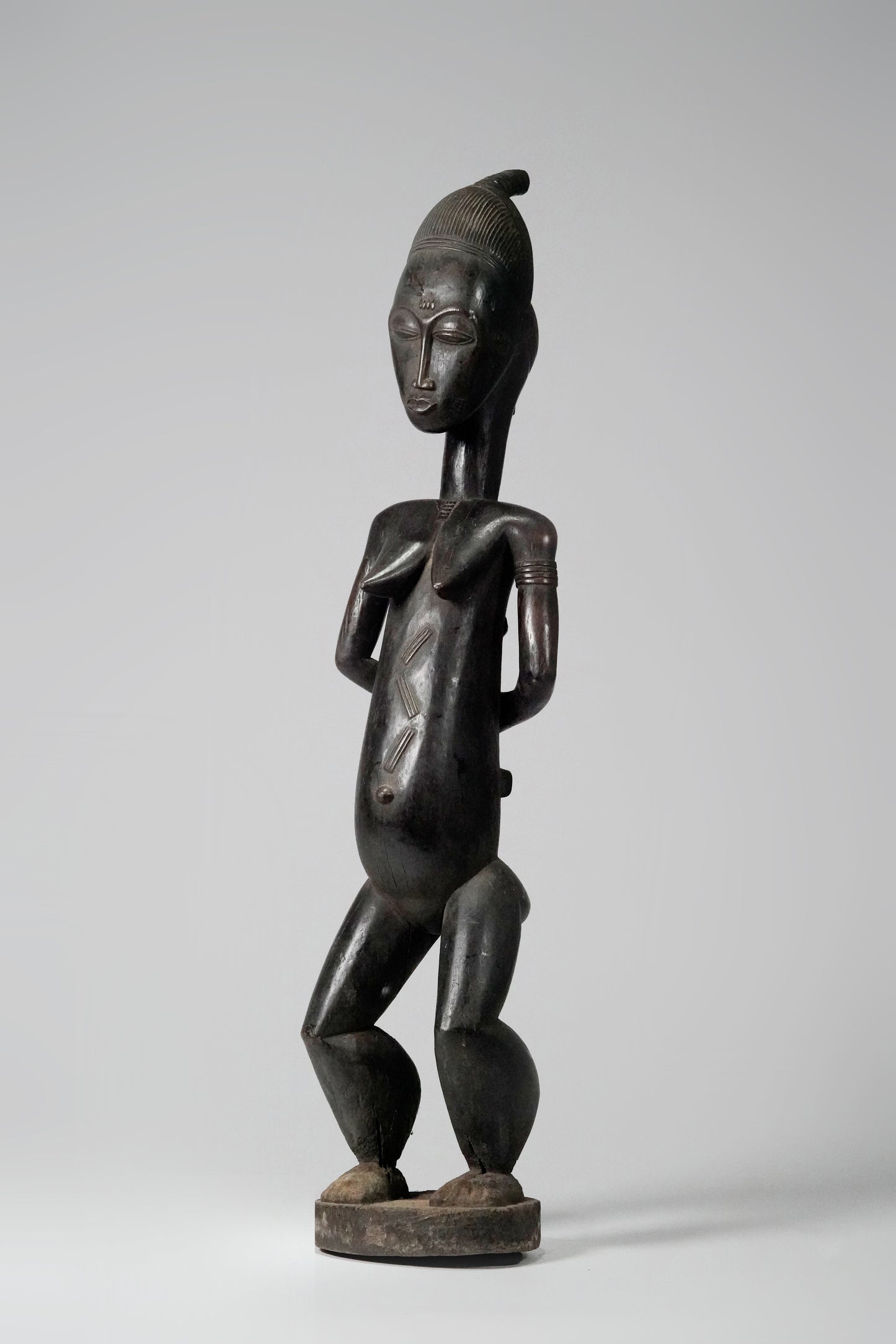 A tall, Baule Maternity