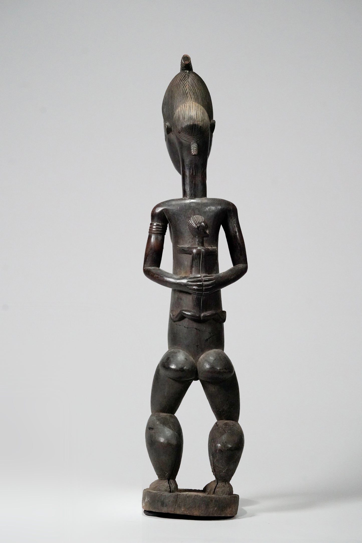 A tall, Baule Maternity