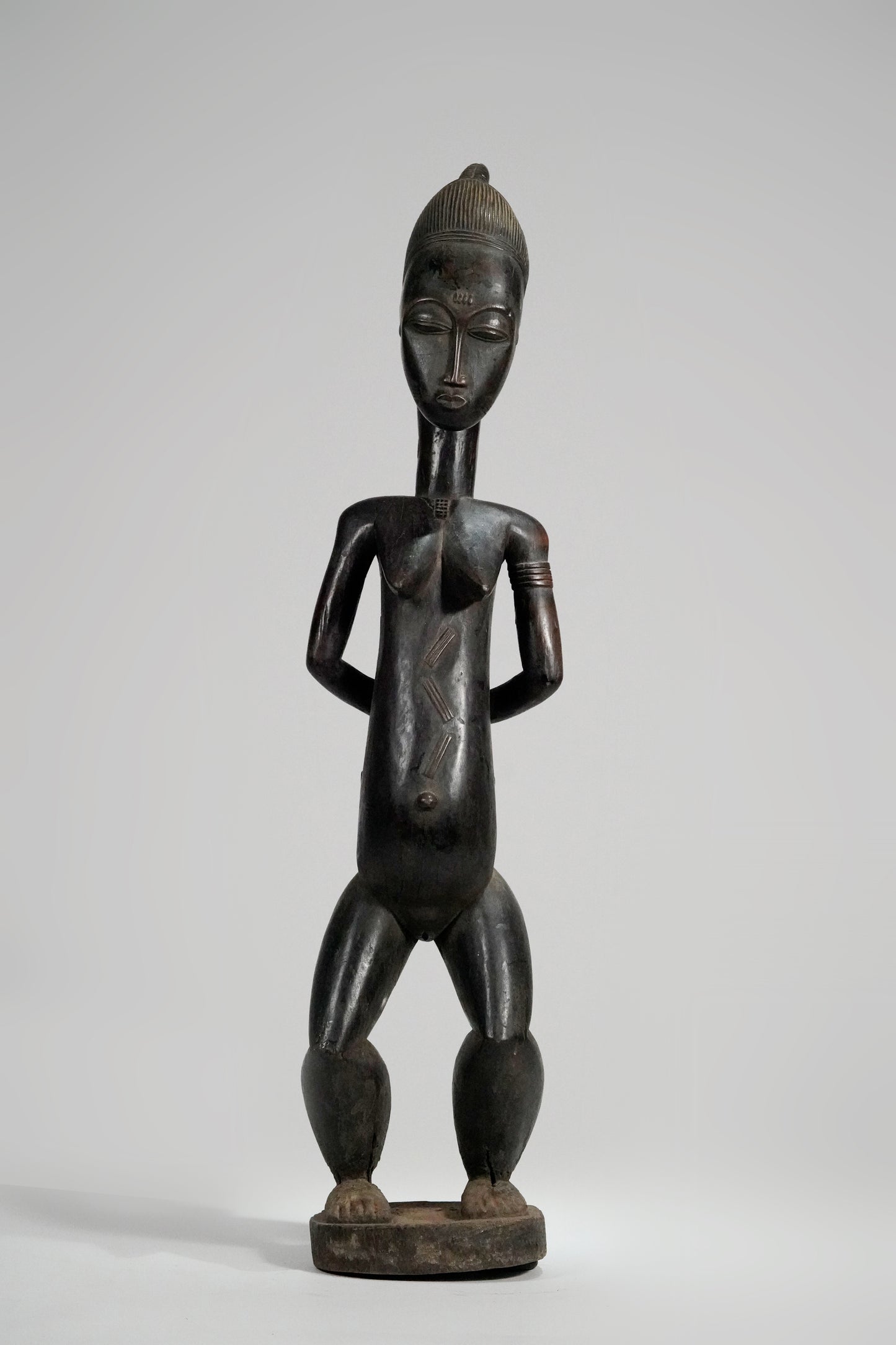 A tall, Baule Maternity