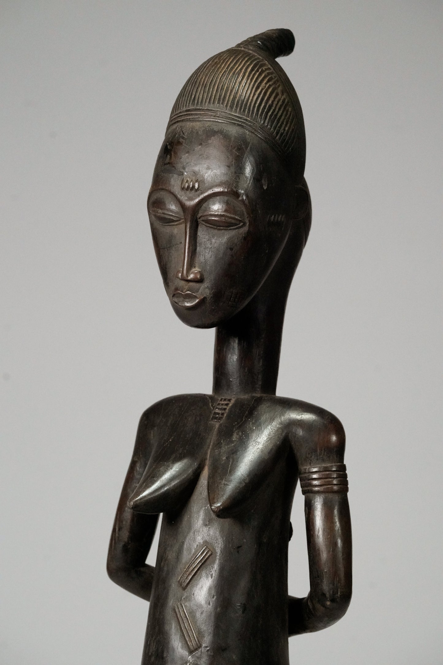 A tall, Baule Maternity