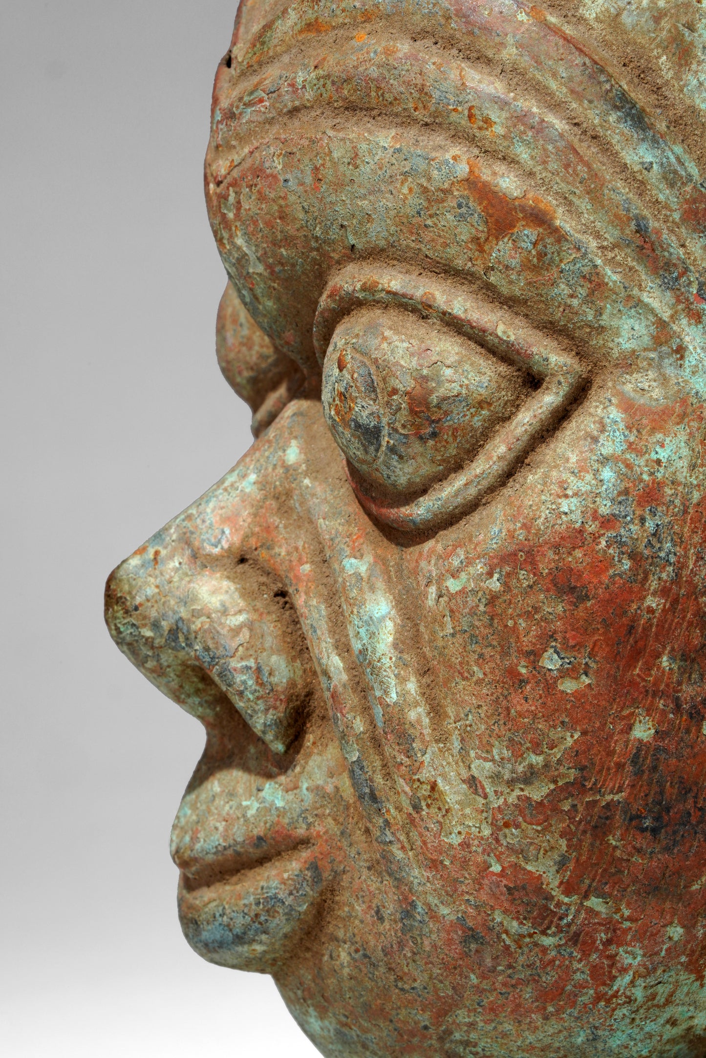 A bronze head in the style of Tada