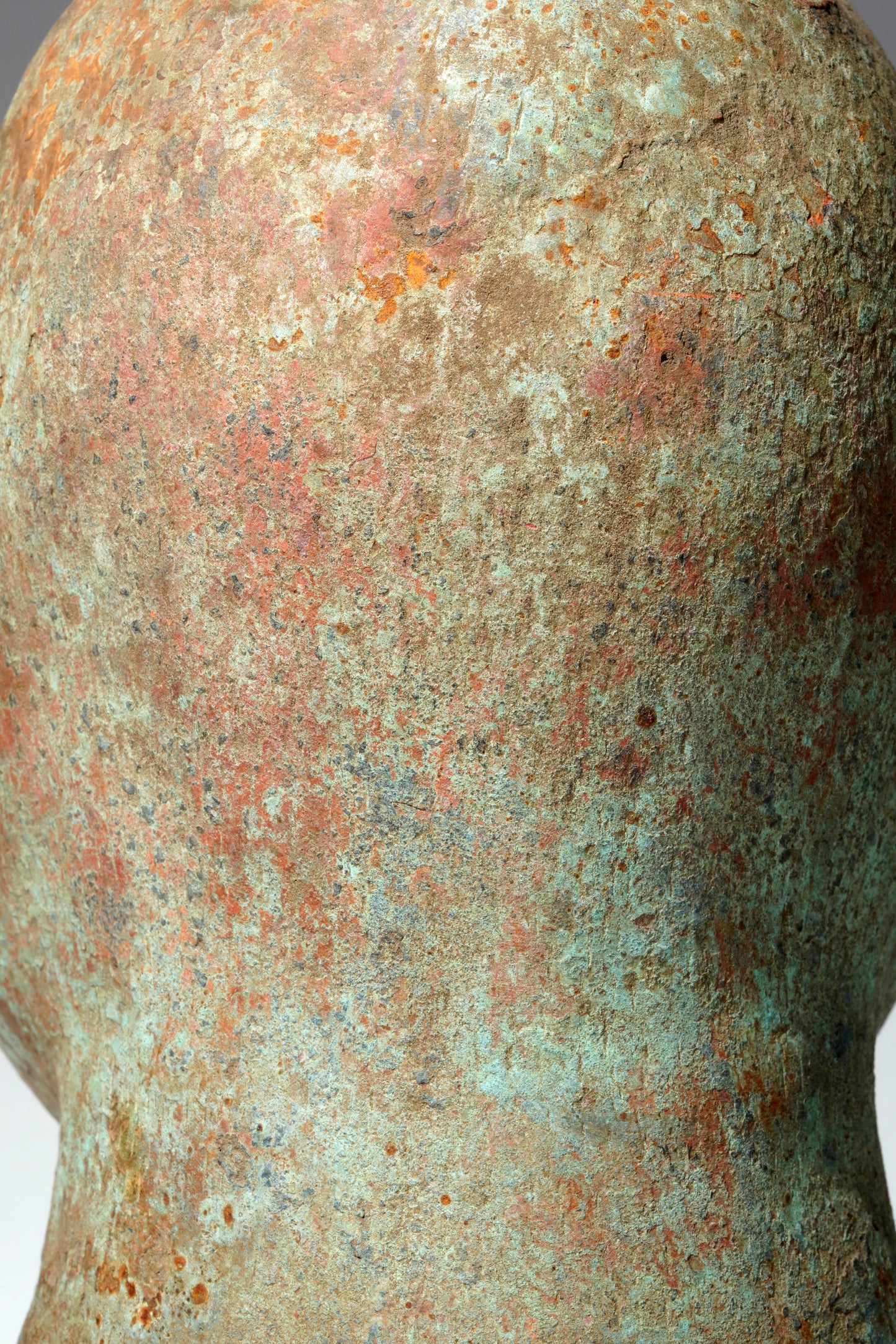 A bronze head in the style of Tada