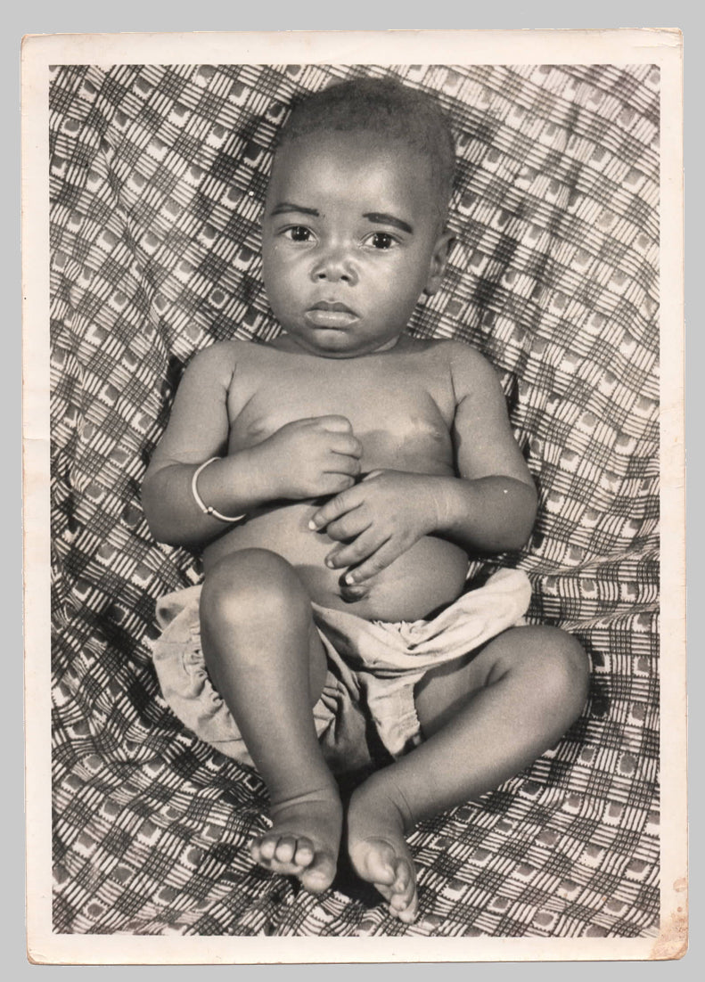 Sixteen original photos by Malick Sidibé and others