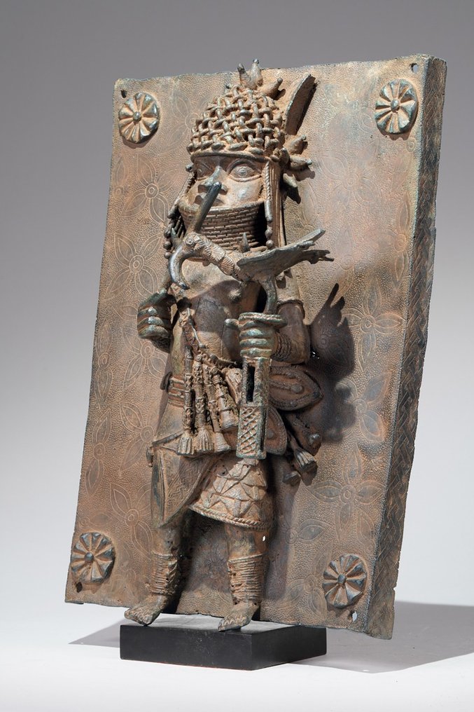 A brass plate probably depicting Oba Esigie in the style of Benin