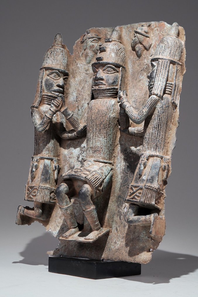 A fragmentary brass plate in the style of Benin