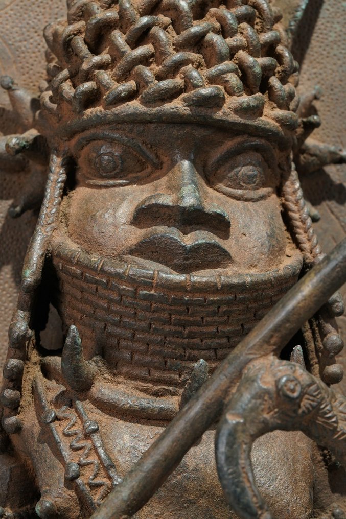 A brass plate probably depicting Oba Esigie in the style of Benin