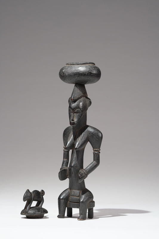 A Senufo “bowl keeper” sculpture