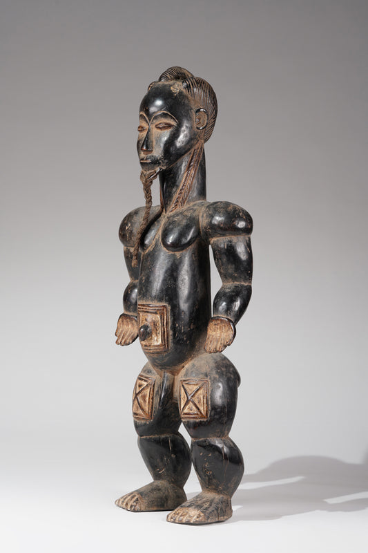 A Bete male sculpture
