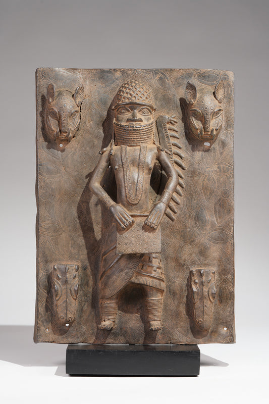 A Bronze plate in the style of Benin, called Ama