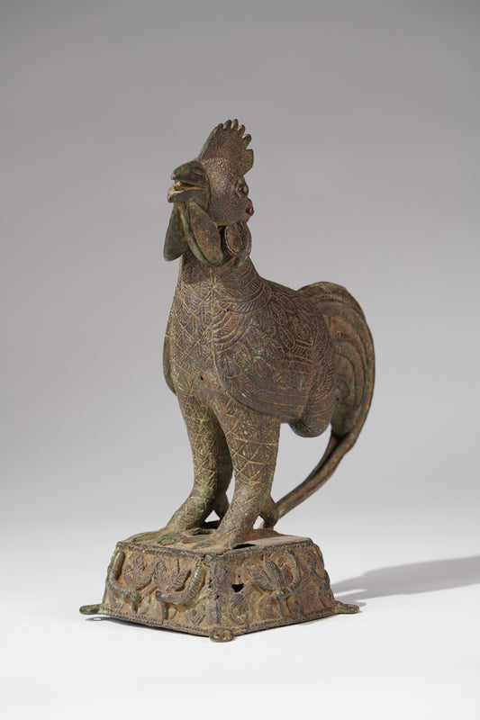 A unique brass rooster in the style of Benin