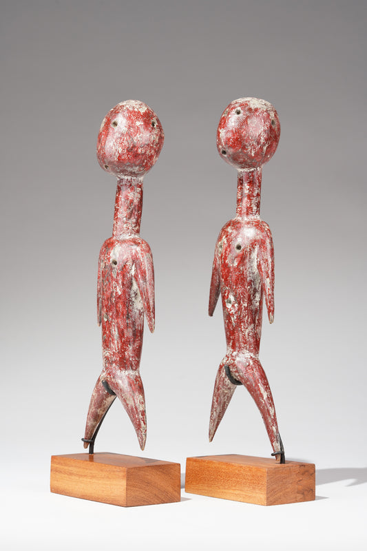 An extremely rare 'reddish' painted Prampram couple