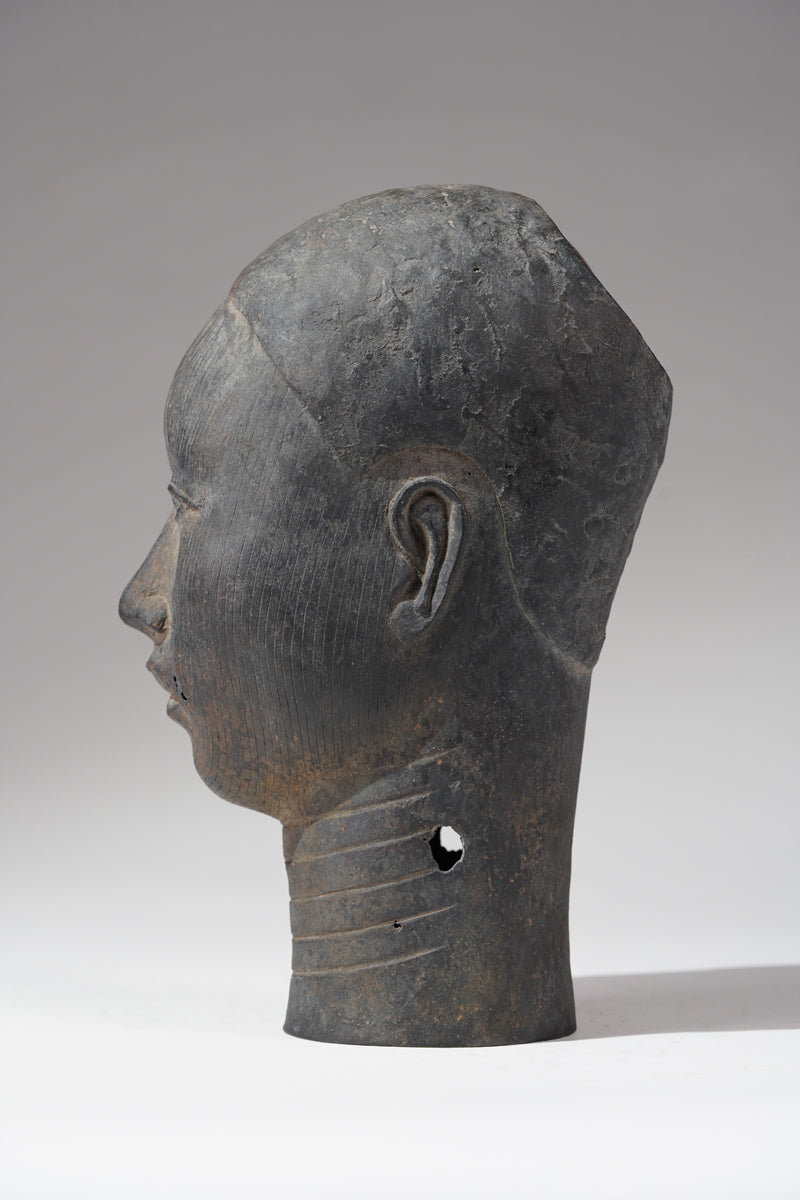 A naturalistic, thinwalled bronze head