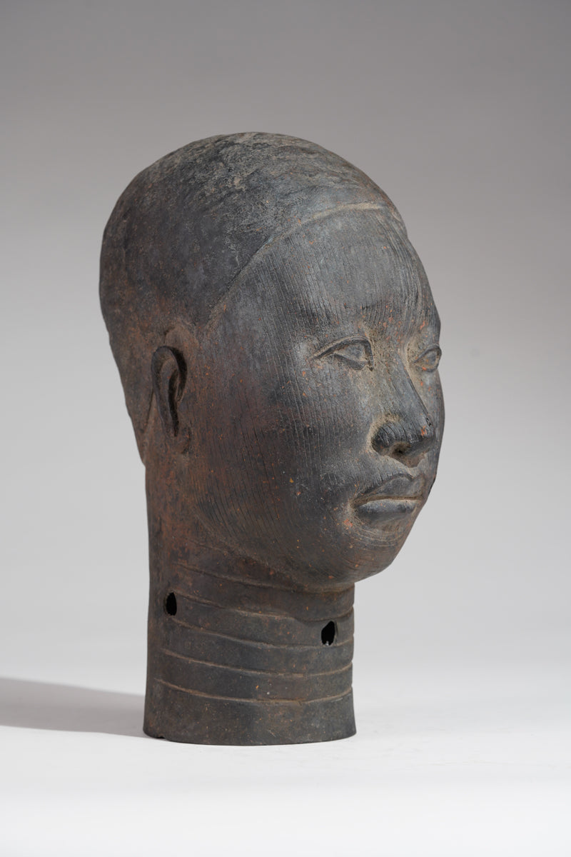A naturalistic, thinwalled bronze head