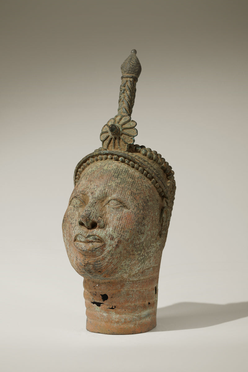 A crowned bronze head of Olokun