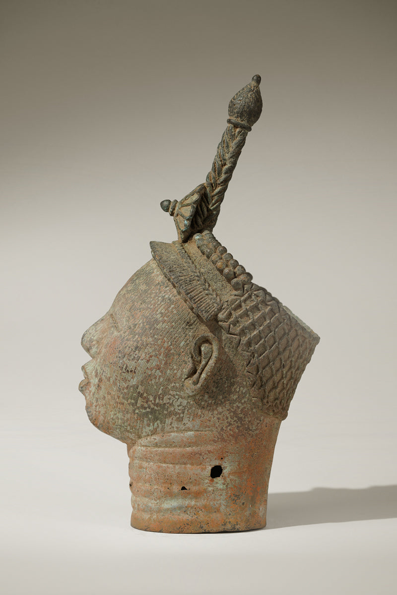 A crowned bronze head of Olokun