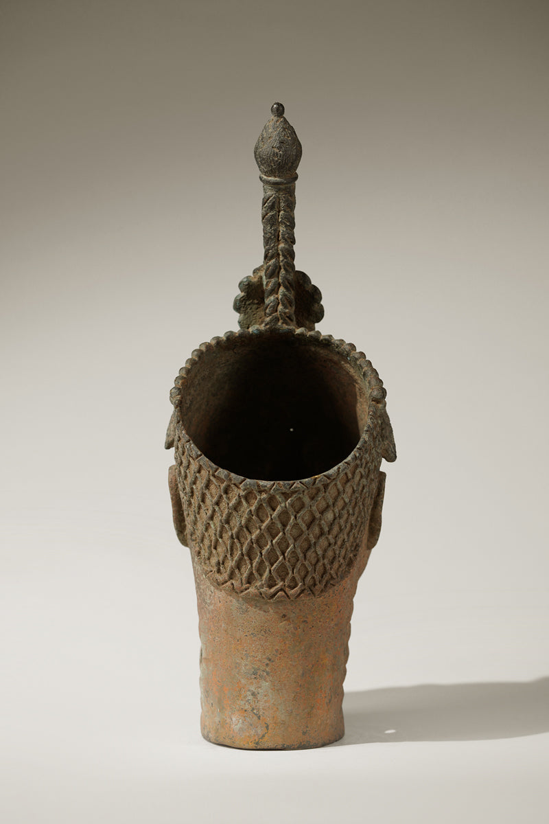 A crowned bronze head of Olokun