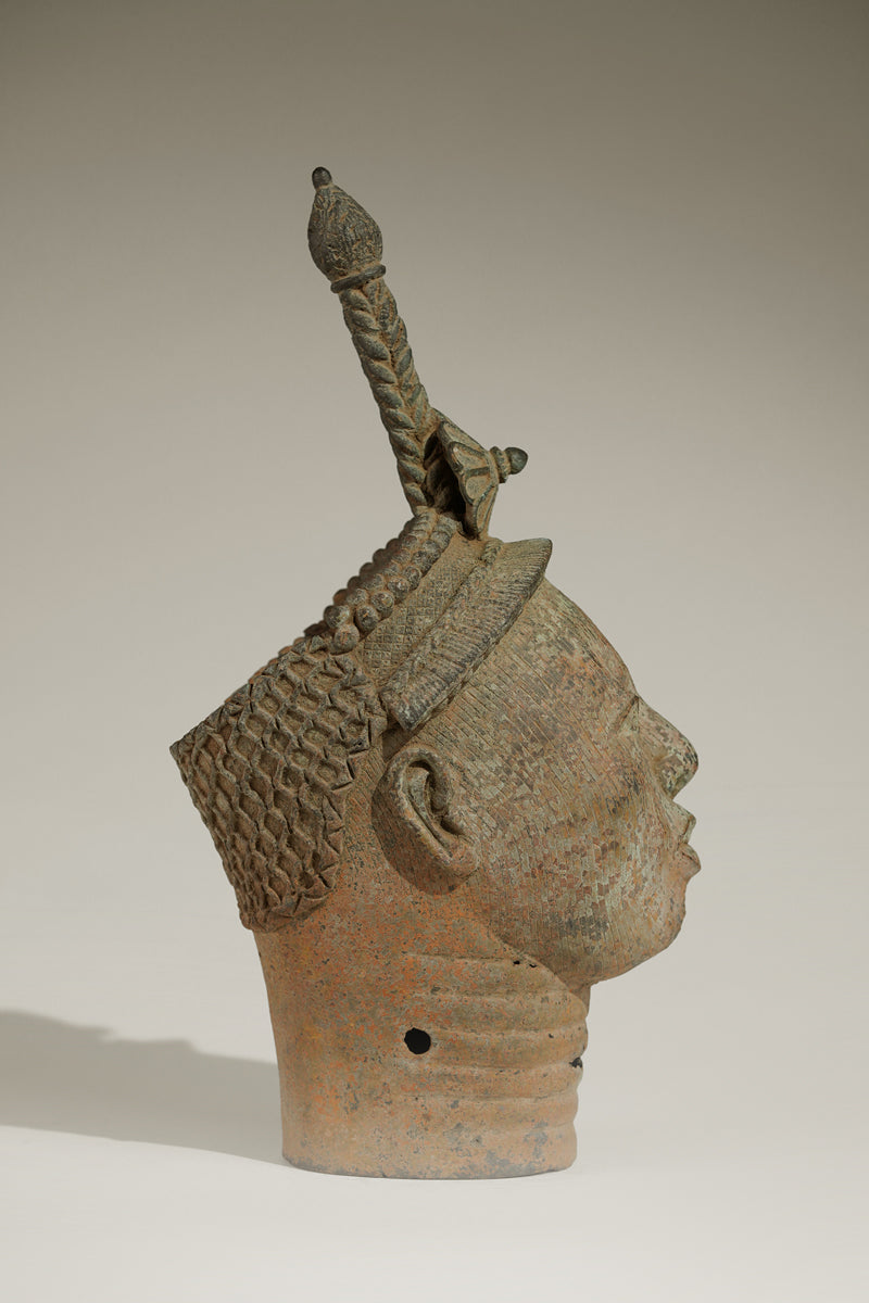 A crowned bronze head of Olokun