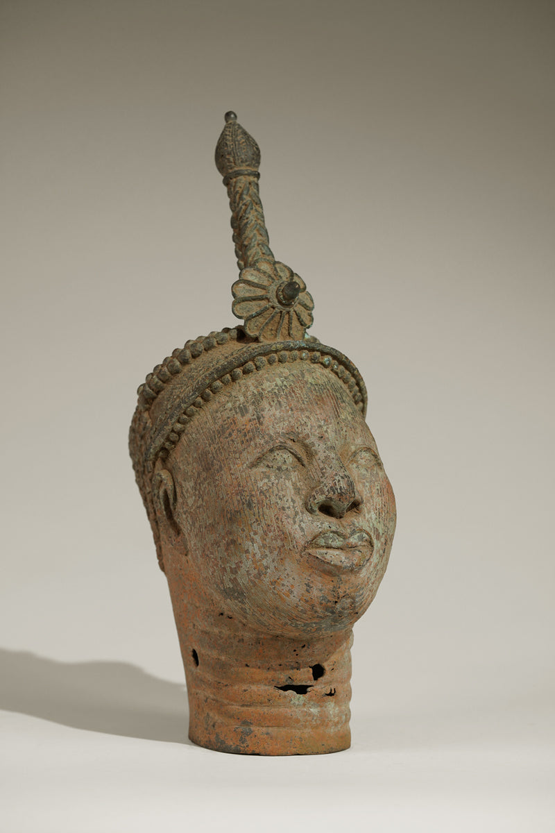 A crowned bronze head of Olokun