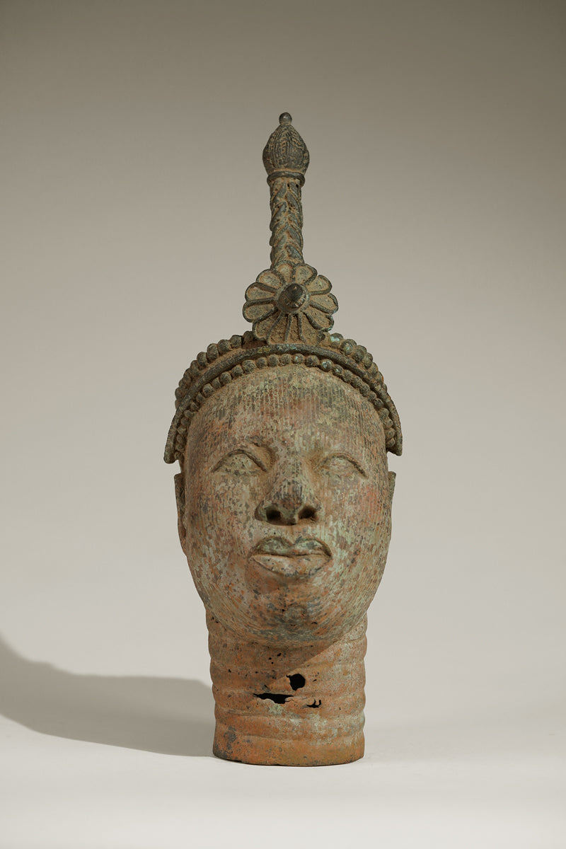 A crowned bronze head of Olokun