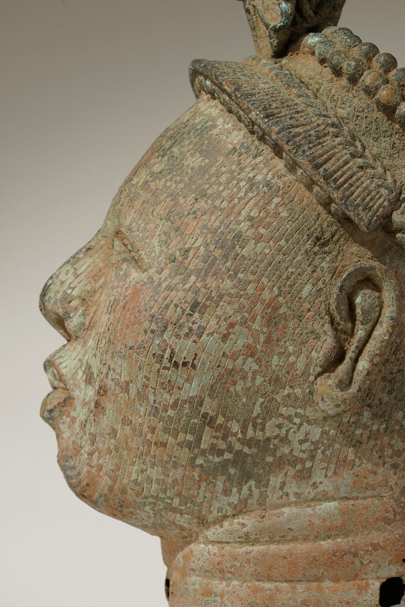 A crowned bronze head of Olokun