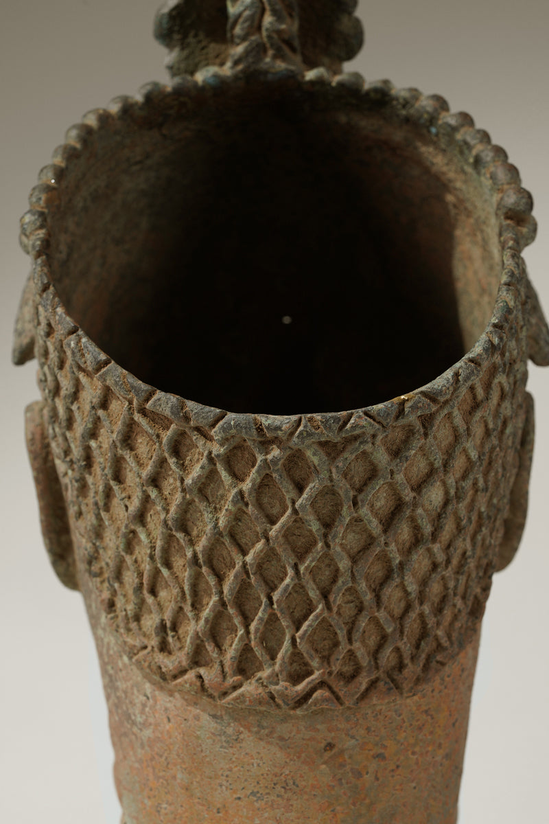 A crowned bronze head of Olokun