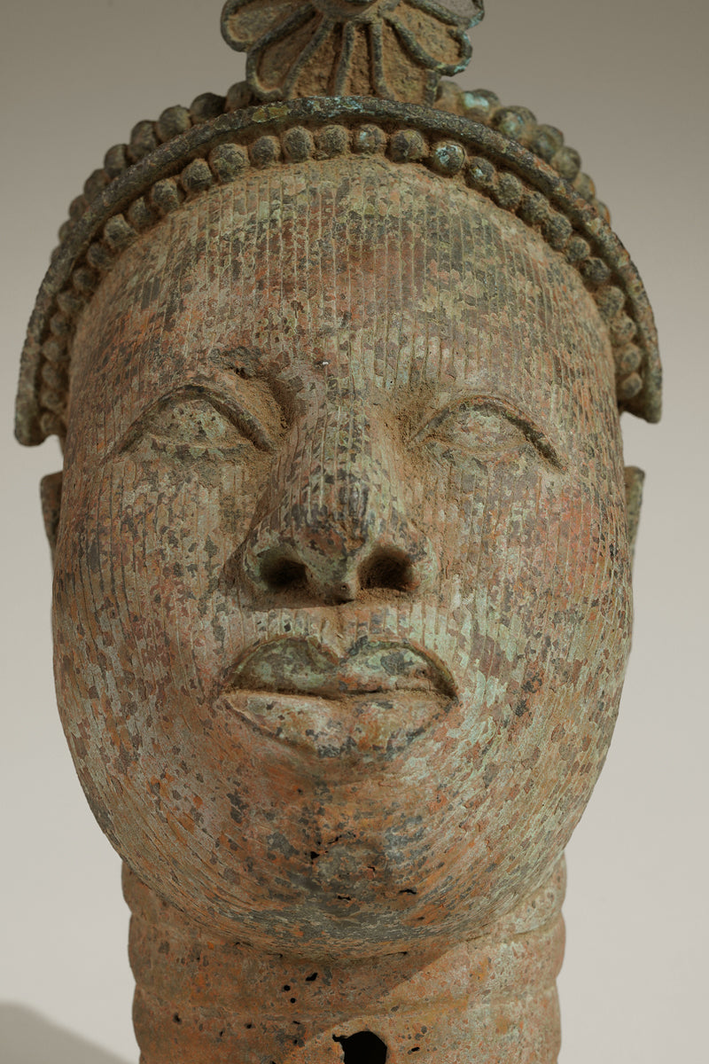 A crowned bronze head of Olokun