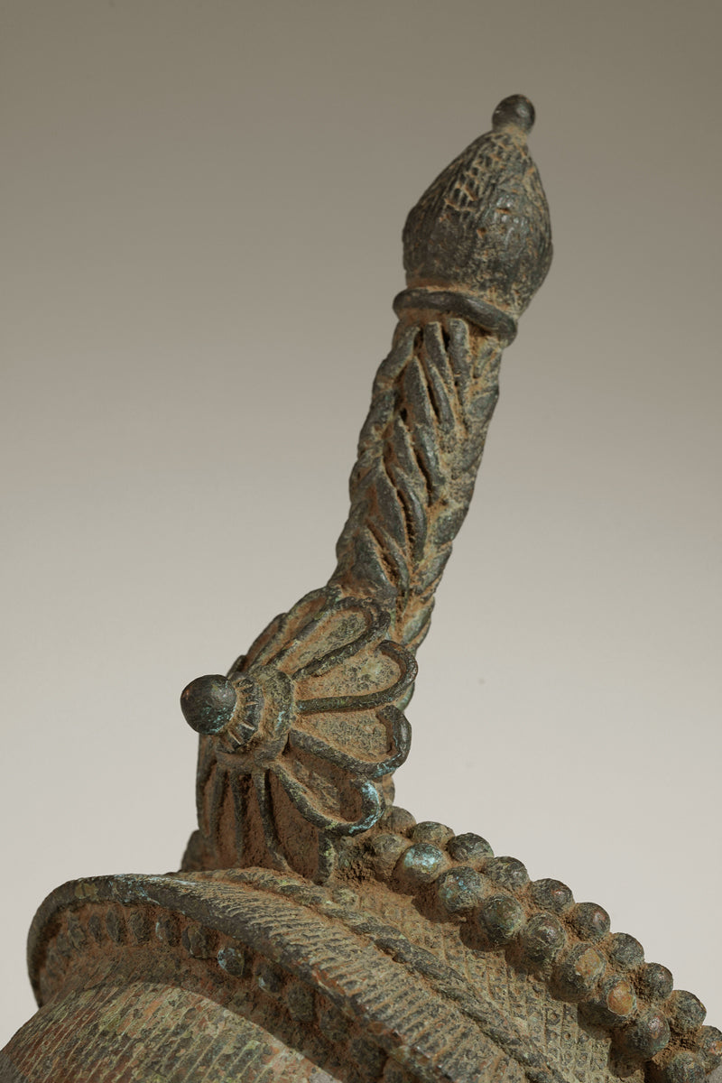 A crowned bronze head of Olokun