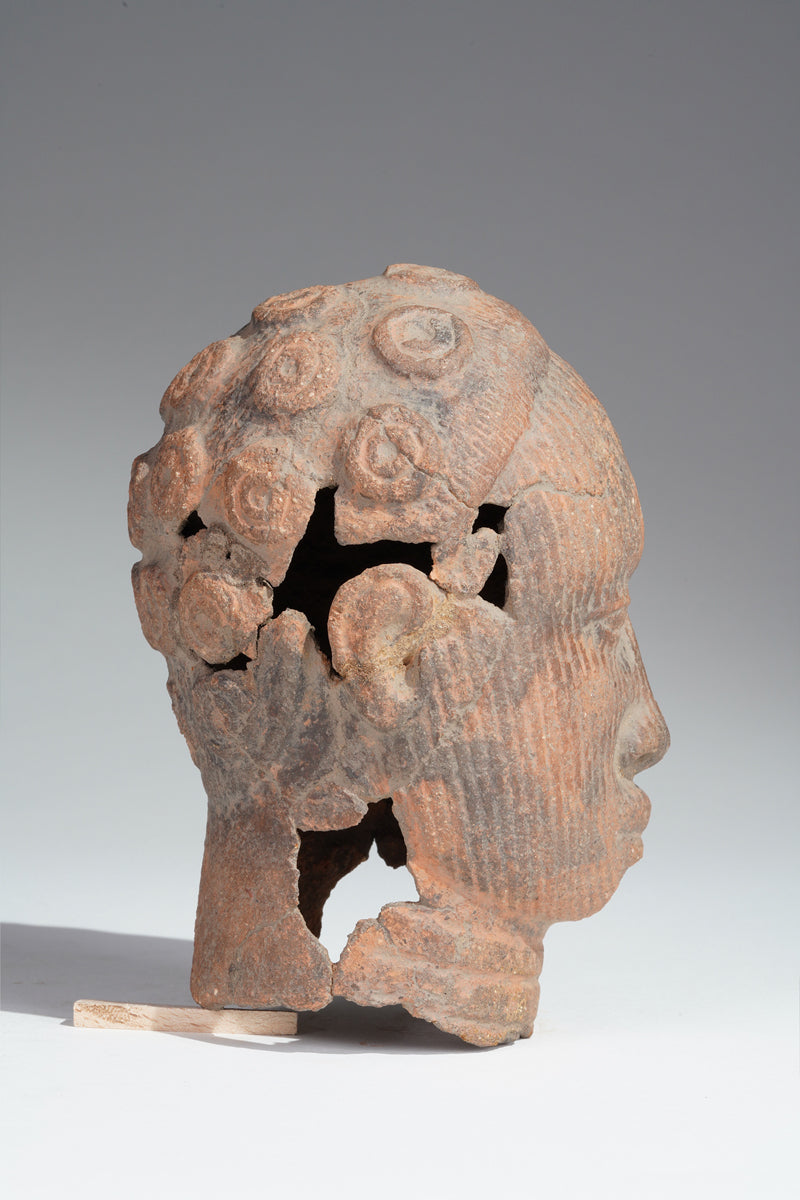 A fragmentary Ife terracotta head