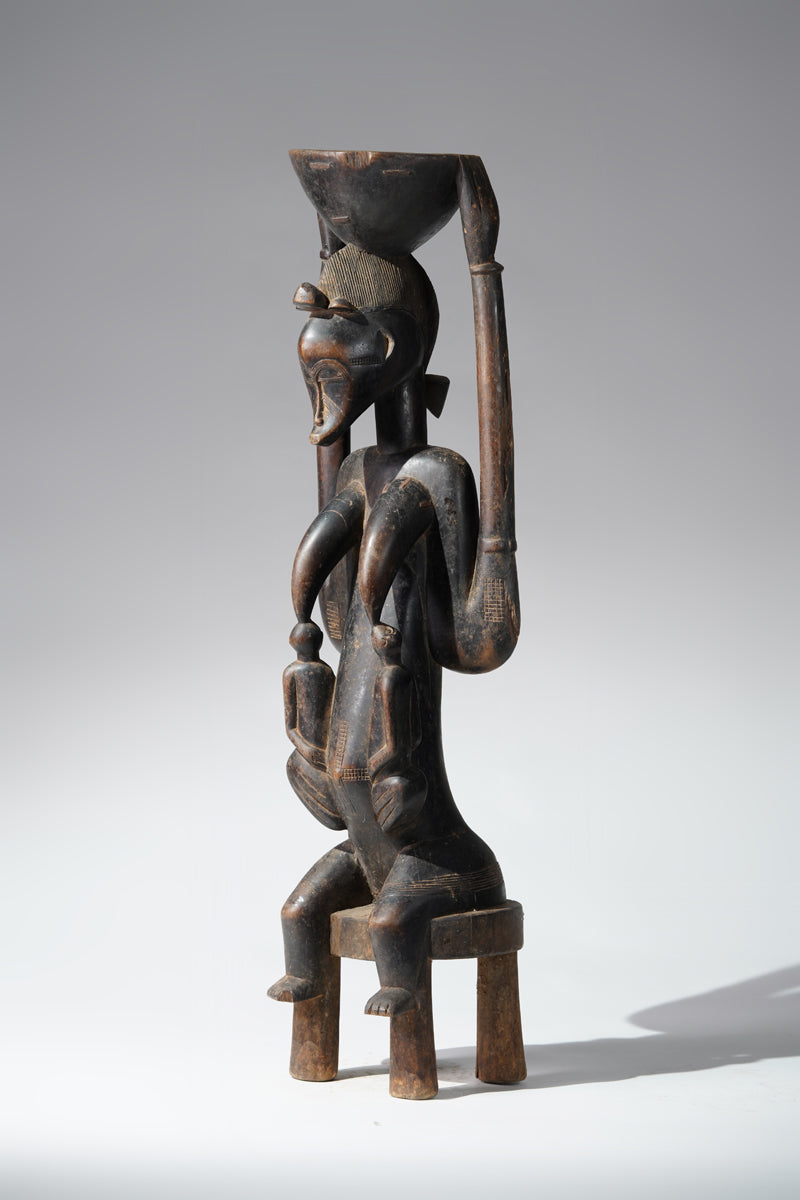 A Senufo maternity sculpture