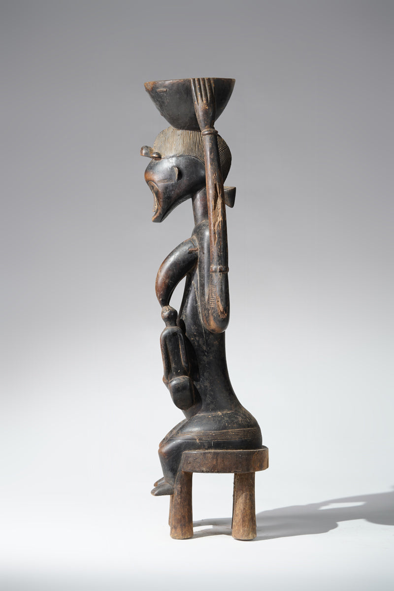 A Senufo maternity sculpture