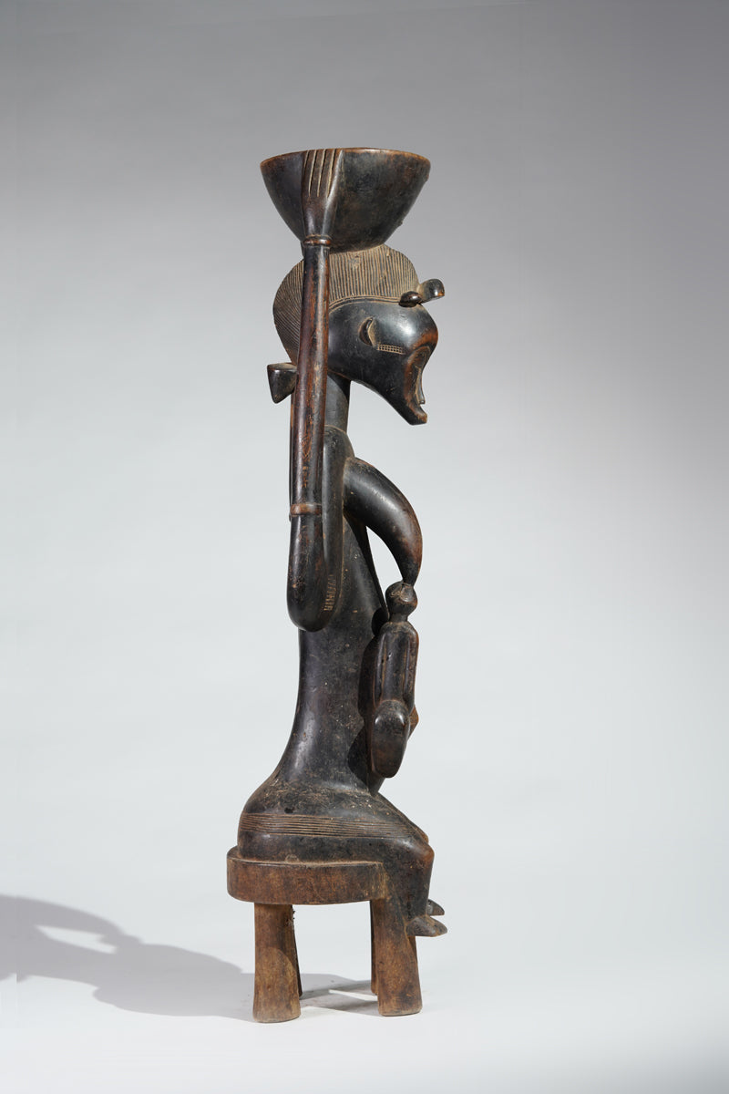 A Senufo maternity sculpture