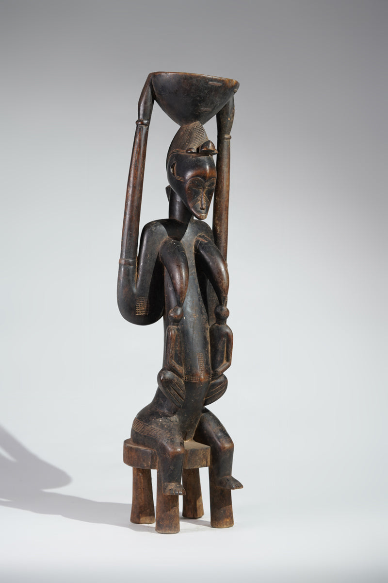 A Senufo maternity sculpture