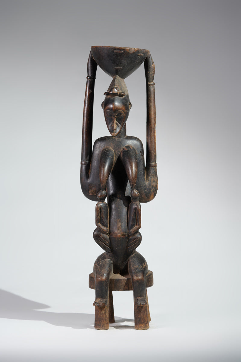 A Senufo maternity sculpture