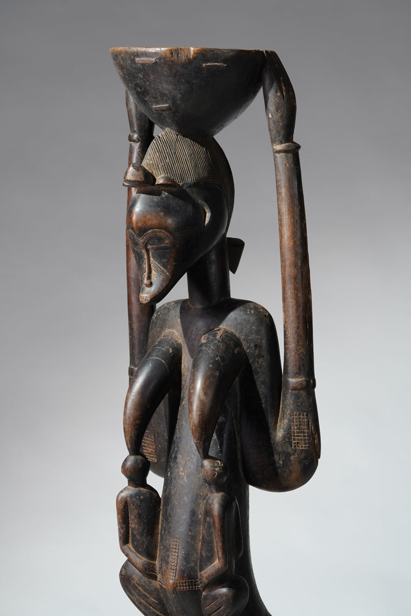 A Senufo maternity sculpture